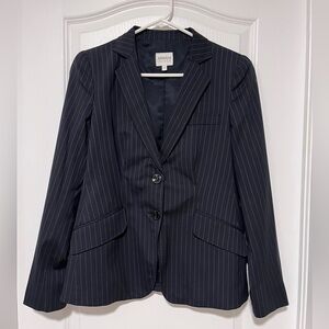 Navy pinstripe design by Armani Collezioni.
Excellent condition